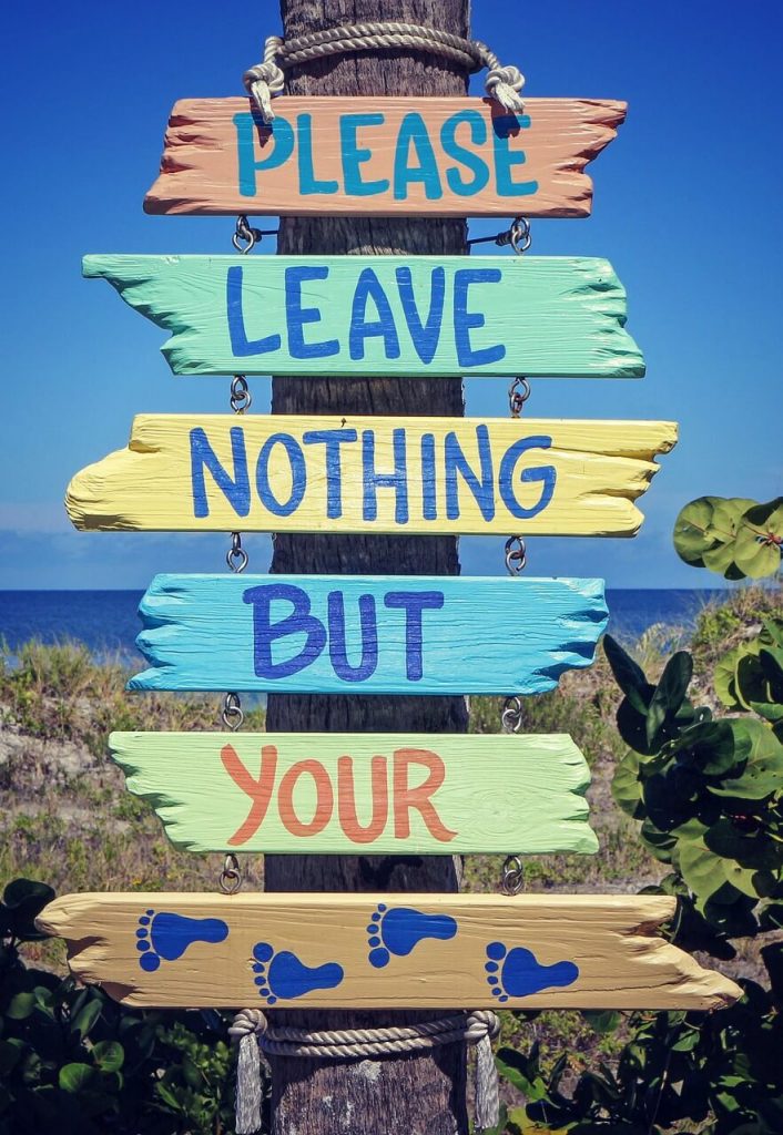 Sign on a beach, leave nothing