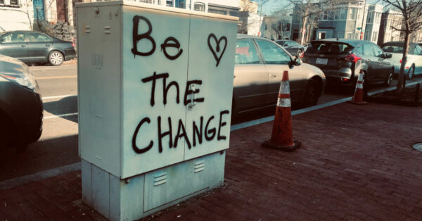 Graffitti Be the change on street furniture by Maria Thalassinou on Unsplash